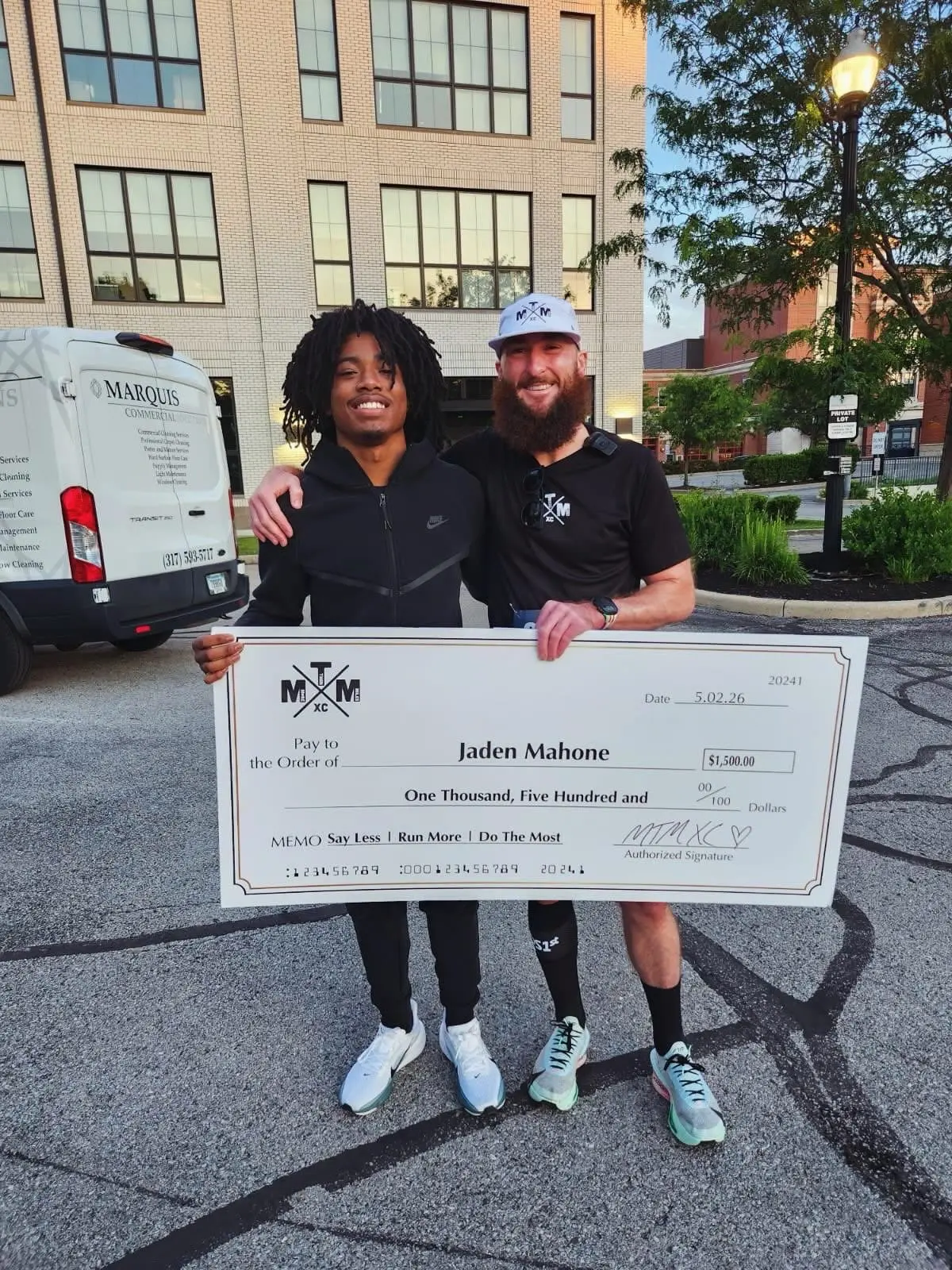 Jaden and Bryan with check Jaden and Bryan with check